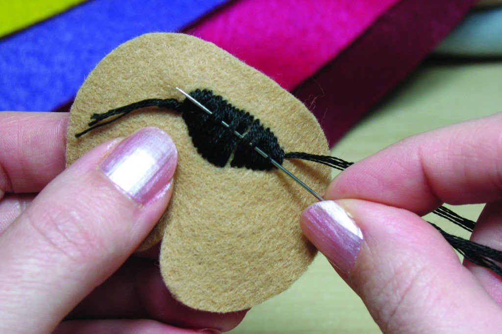 Tying off a satin stitch